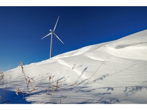 Drifted snow and a wind turbine north of Hussar.