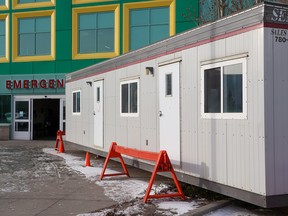 A trailer for extra space awaits use outside the ER at the Alberta Children’s Hospital on Monday.