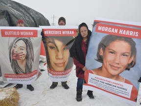 Protesters hold up images of Buffalo Woman, Mercedes Myran and Morgan Harris at an encampment and blockade that has been set up at the entrance to the Brady Road Landfill for more than 10 days. Dave Baxter/Winnipeg Sun/Local Journalism Initiative