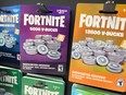 Fortnite V-Bucks are offered for sale at a video game retailer on December 19, 2022 in Chicago, Illinois. Epic Games, the maker of Fortnite, has been ordered by the Federal Trade Commission to pay $520 million to settle allegations that it collected personal data from children without the the consent of a parent or guardian.