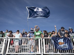 Fans cheer following the CFL Touchdown Atlantic game between the Toronto Argonauts and the Saskatchewan Roughriders at Acadia University in Wolfville, N.S.