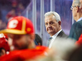Oct 25, 2022; Calgary, Alberta, CAN; Calgary Flames head coach Darryl Sutter on his bench against the Pittsburgh Penguins during the third period at Scotiabank Saddledome.
