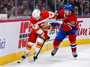 Matthew Phillips battles for the puck during Monday night’s game against the Montreal Canadiens.