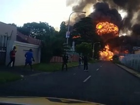 A gas tanker explodes, in Boksburg, South Africa on Dec. 24, 2022, in this screen grab from a video obtained by Reuters.