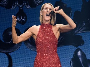 In this file photo taken on September 19, 2019 Canadian singer Celine Dion performs on the opening night of her new world tour "Courage" at the Videotron Centre in Quebec City, Quebec. Celine Dion revealed on her Instagram account on December 8, 2022 that she is suffering from a "very rare neurological disorder", which has forced her to postpone concerts on her "Courage World Tour" in Europe once again.
