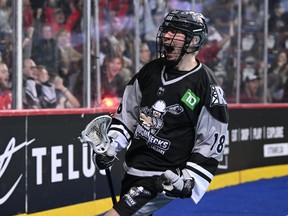 The Calgary Roughnecks’ Harrison Matsuoka celebrates during a game against the Vancouver Warriors on WestJet Field at Scotiabank Saddledome on Saturday, Dec. 10, 2022.