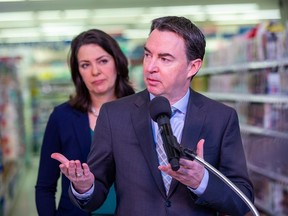 Premier Danielle Smith and Minister of Health Jason Copping make an announcement about the availability of children's medication on Tuesday, Dec. 6, 2022 in Edmonton.
