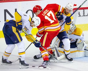 Milan Lucic battles for the puck during a game against the Nashville Predators on Nov. 3.