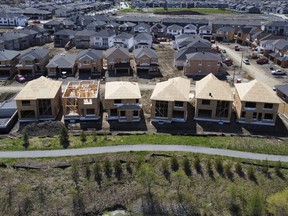 Canada's banking regulator is expected to make an announcement regarding the interest rate used in a key stress test for uninsured mortgages this morning. New homes are built in a housing construction development in the west-end of Ottawa on May 6, 2021.