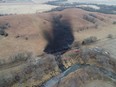 Emergency crews work to clean up the largest U.S. crude oil spill in nearly a decade, following the leak at the Keystone pipeline operated by TC Energy in rural Washington County, Kansas, U.S., December 9, 2022.