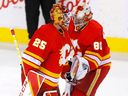 Calgary Flames goalie Jacob Markstrom is replaced with Dan Vladar after the Vegas Golden Knights' third goal in the second period of NHL action at the Scotiabank Saddledome in Calgary on Thursday, April 14, 2022. 