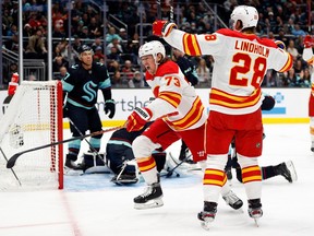 Calgary Flames forward Tyler Toffoli celebrates a goal against the Seattle Kraken at Climate Pledge Arena in Seattle on Dec. 28, 2022. The Flames won 3-2 a night after a hard-fought 2-1 loss to the Edmonton Oilers.