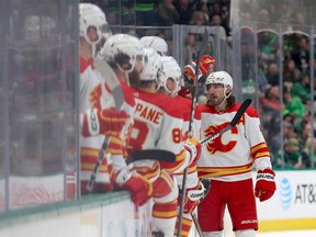 Calgary Flames defenceman Chris Tanev celebrates after scoring a goal against the Dallas Starsat American Airlines Center in Dallas on Jan. 14, 2023.
