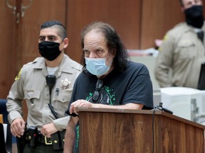 Adult film star Ron Jeremy, who has been charged with raping three women and sexually assaulting a fourth in incidents in West Hollywood from 2014 to 2019, makes his first appearance in Los Angeles County Superior Court, Calif., June 23, 2020.