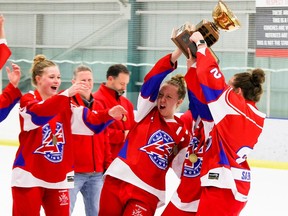 The Calgary Fusion celebrate winning the Esso Golden Ring U19AA final at the Northeast Sportsplex in Calgary on Sunday, Jan. 22, 2023. The Fusion defeated the Zone 2 Blaze 4-3 in overtime in the championship game.