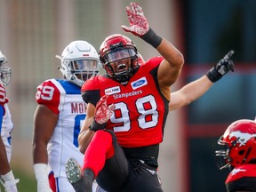 Calgary Stampeders defensive lineman James Vaughters celebrates after a sack against Montreal Alouettes quarterback Matthew Shiltz at McMahon Stadium in Calgary on July 21, 2018.