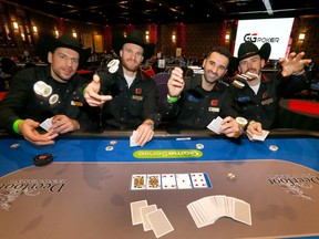 From left, Calgary Flames Milan Lucic, Jonathan Huberdeau, Nazem Kadri and MacKenzie Weegar and the rest of the team take part in the Calgary Flames and the Calgary Flames Ambassadors’ 16th Celebrity Poker Tournament in support of the Calgary Flames Foundation at the Deerfoot Inn & Casino on Tuesday, Jan. 24, 2023.