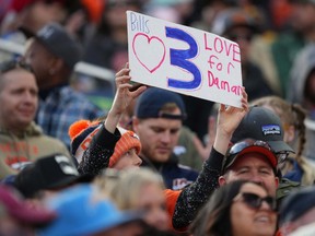 Denver Broncos fan holds a sign in support for Buffalo Bills safety Damar Hamlin (3) (not pictured) during the game against the Los Angeles Chargers at Empower Field at Mile High.