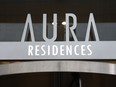 The sign on the Aura condominium building is shown in Toronto on Tuesday, Jan. 17, 2023. A unit in the building was recently sold without the owner's knowledge.