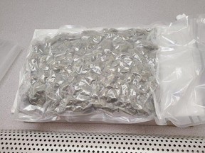 Two people from Calgary have been charged with drug exportation and trafficking after methamphetamine was found in a shop vacuum.