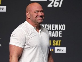 UFC president Dana White walks on to the stage during weigh-ins for UFC 261 at VyStar Veterans Memorial Arena.