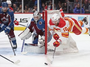 Calgary Flames forward Jonathan Huberdeau sails over the goal looking for an opening against the Colorado Avalanche at Ball Arena in Denver on Saturday, Feb. 25, 2023.