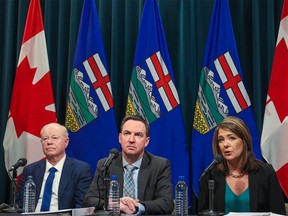 Dr. John Cowell, Health Minister Jason Copping and Premier Danielle Smith provided updates on the work underway to reduce wait times and improve patient care in Alberta during a press conference at the McDougall Centre in Calgary on Monday, February 27, 2023.
