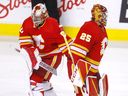 Calgary Flames goaltender Jacob Markstrom, right, is replaced with Dan Vladar in a game last year.