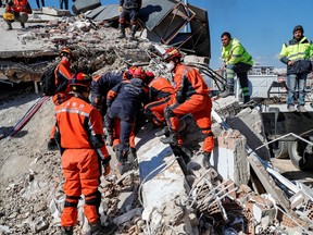Search and rescue teams look for survivors in the rubble, in the aftermath of a deadly earthquake, in Hatay, Turkey, February 9, 2023.