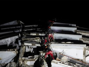 A rescue team works on a collapsed building, following an earthquake in Antakya, Turkey February 6, 2023.