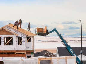 Construction continues on new homes in the Livingston development on the northern edge of Calgary on Thursday, January 12, 2023.