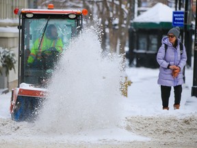 Stephen Avenue Mall is cleared of snow as winter swept back into Calgary on Tuesday, February 21, 2023.