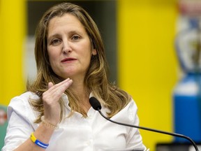 Deputy Prime Minister and Finance Minister Chrystia Freeland answers media questions during a visit to the International Brotherhood of Boilermakers in Edmonton, Oct. 20, 2022.