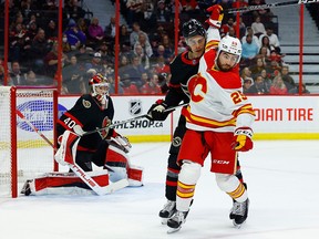 No panic in Flames lineup, despite lack of third-period comebacks Flames forward Dillon Dube tries to evade Ottawa Senators defenceman Artem Zub during Monday’s game.