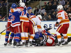 The Calgary Flames and New York Rangers get acquainted in the first period at Madison Square Garden on Monday night.