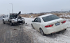 A car is towed after getting stuck in a snowbank on Feb. 23, 2023. OPP/TWITTER