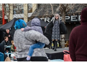 People gather outside the Trapped Escape Room to watch the Can't Stop The Love In Kensington drag-queen show as part of the Chinook Blast winter festival in this photo from Feb. 5.