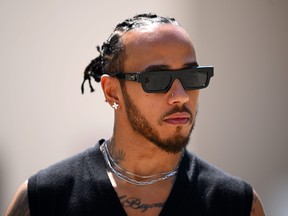 Lewis Hamilton of Great Britain and Mercedes walks in the Paddock prior to practice ahead of the F1 Grand Prix of Bahrain at Bahrain International Circuit on March 03, 2023 in Bahrain, Bahrain. (Photo by Clive Mason/Getty Images)