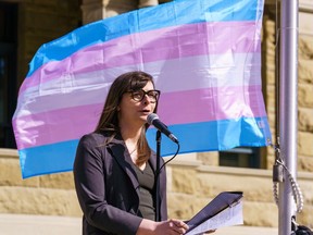Anna Murphy, Vice-Chair of the city of Calgary Social Wellbeing Advisory Committee, speaks at the Transgender community flag flying at city hall in Calgary on Thursday, March 31, 2022.