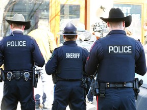 Alberta Sheriffs and Calgary police gather prior to a tour of East Village and part of downtown Calgary on Thursday, March 23, 2023.