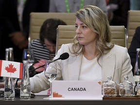 Canada's Foreign Minister Melanie Joly attends the G20 foreign ministers' meeting in New Delhi Thursday, March 2, 2023. Joly and her Chinese counterpart have had a testy exchange over Joly raising concerns that Beijing's envoys may be interfering in domestic matters.