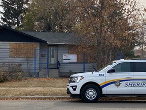 A court order authorized the Safer Communities and Neighbourhoods (SCAN) unit of the Alberta Sheriffs to board up this drug house in Lloydminster and erect a fence to prevent anyone from entering the property until Dec. 16, 2021. Supplied photo