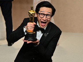 US-Vietnamese actor Ke Huy Quan poses with the Oscar for Best Actor in a Supporting Role for "Everything Everywhere All at Once" in the press room during the 95th Annual Academy Awards at the Dolby Theatre in Hollywood, California on March 12, 2023. (Photo by Frederic J. Brown / AFP)