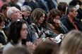 Families and friends listen to a tribute to victims before the Mass Casualty Commission delivers its final report into the April 2020 mass shootings, when a gunman who at one point masqueraded as a police officer caused country's worst mass shooting during a 12-hour rampage, in Truro, Nova Scotia, Canada, on March 30, 2023.