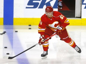 Flames defenceman Troy Stecher steps onto the ice for warmup prior to a game against the Anaheim Ducks on March 10.