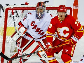 Tyler Toffoli looks to redirect a puck past goalie Antti Raanta of the Carolina Hurricanes on Oct. 22, 2022.