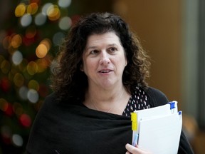 Auditor General Karen Hogan leaves after holding a press conference in Ottawa, Dec. 6, 2022.