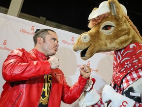 Wrestler Matt Menard with All Elite Wrestling (AEW) has a face-off with Harry the Horse at the announcement that AEW will have the Canadian debut of the "AEW House Rules" wrestling event during the Calgary Stampede, Saturday, July 15 at the Saddledome.