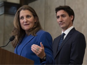 Prime Minister Justin Trudeau looks on as Deputy Prime Minister and Finance Minister Chrystia Freeland speaks in Ottawa, in this photo from Oct. 7, 2022.