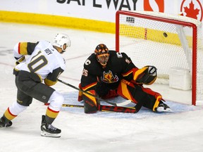 Calgary Flames goaltender Jacob Markstrom is scored on by Vegas Golden Knights forward Nicolas Roy at the Scotiabank Saddledome in Calgary on Thursday, March 23, 2023.